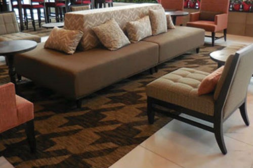 Tuscaloosa-AL-moody-lounge-area-with-wraparound-sofa-and-lounge-chairswrap